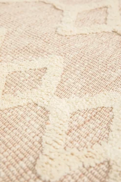 Beige badmat met geometrische figuren