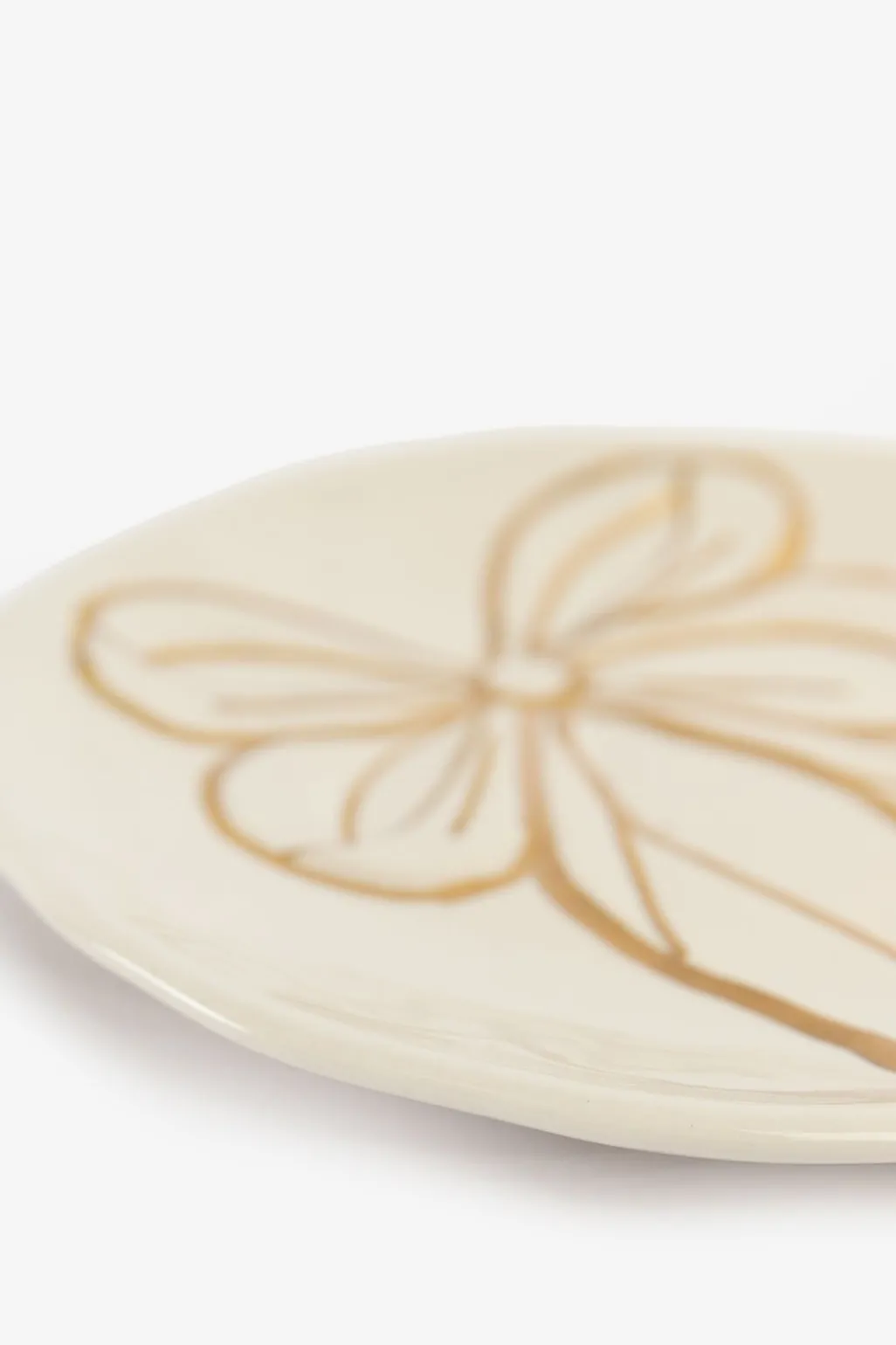 Beige dessertbord met gouden strik