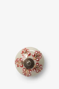 Beige deurknop met oranje bloemetjes