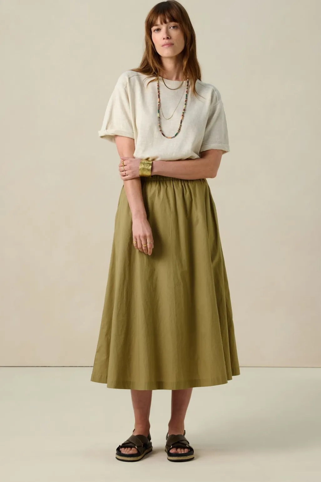 Beige gebreide trui
