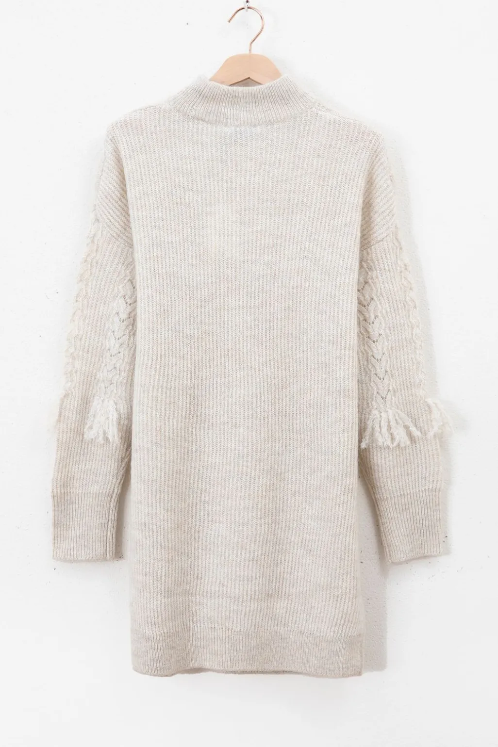 Beige gebreide tuniek met franjes