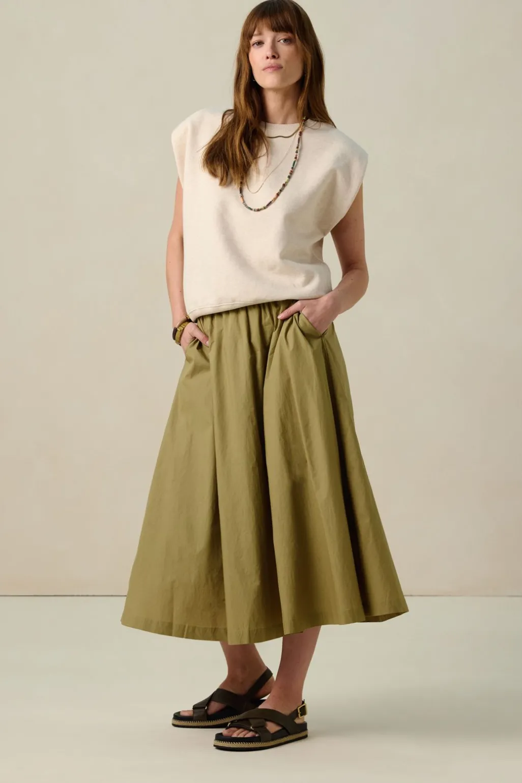 Beige mouwloze sweater