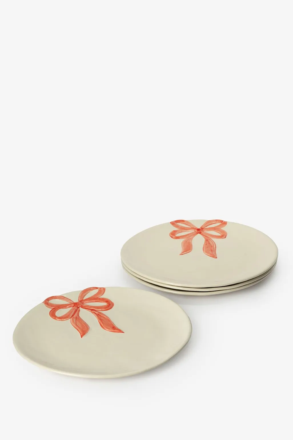 Beige ontbijtbord met roze strik