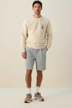Beige sweater met grafische print