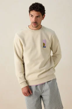 Beige sweater met grafische print