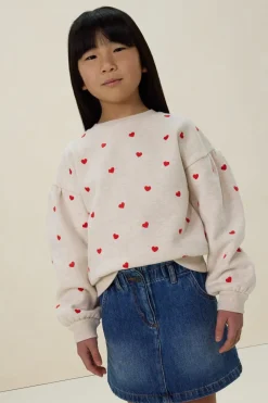 Beige sweater met hartjes