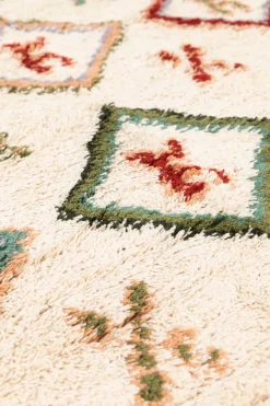 Beige vloerkleed met multicolour patroon