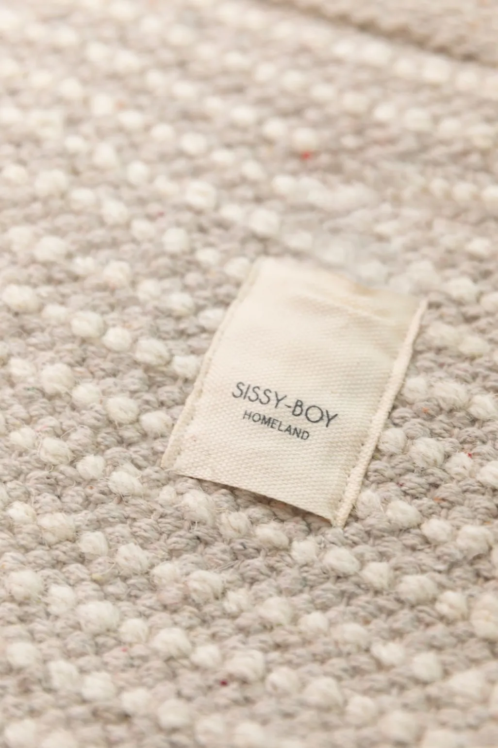 Beige vloerkleed met multicolour patroon