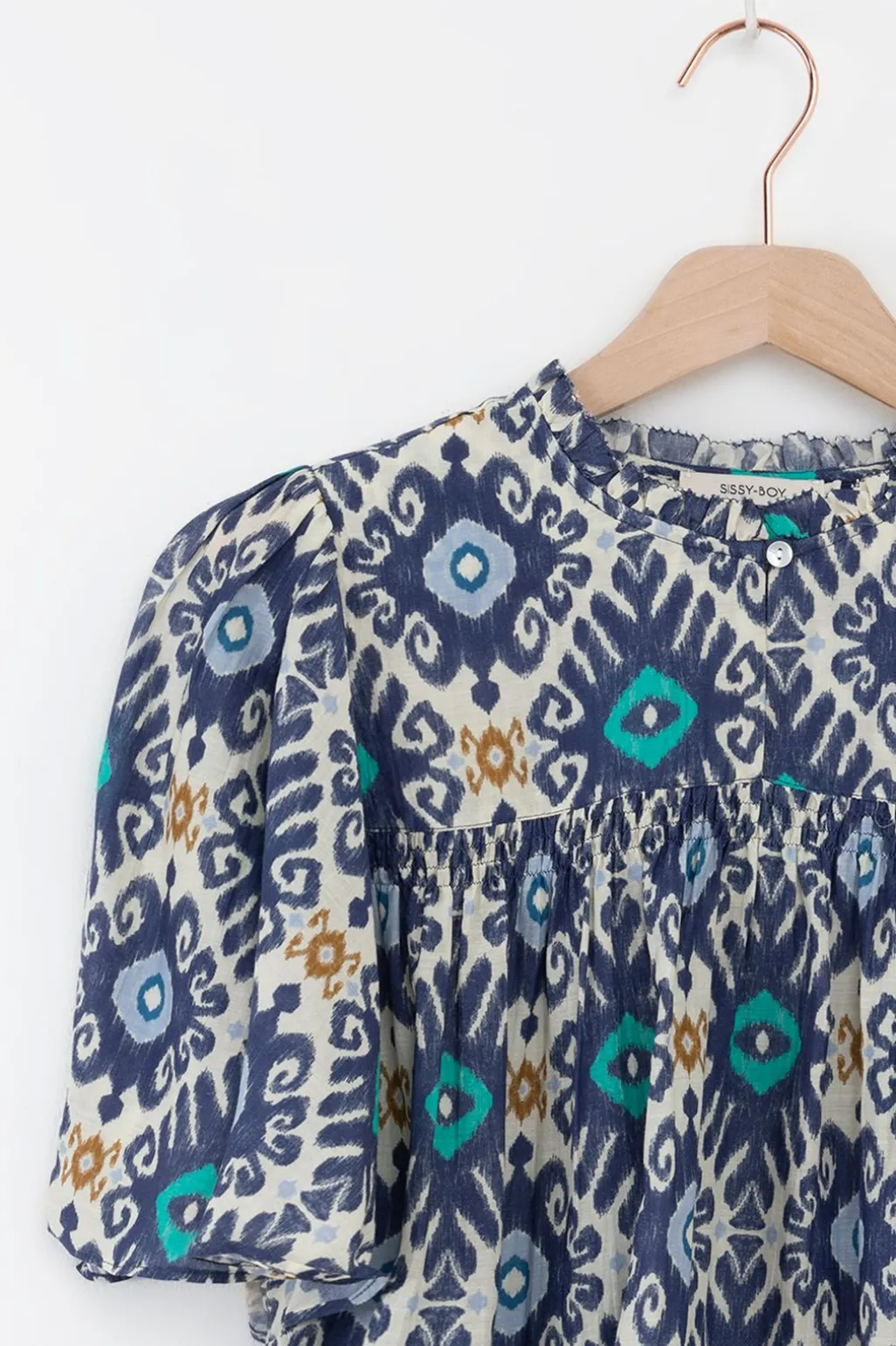 Blauwe A-lijn blouse met print