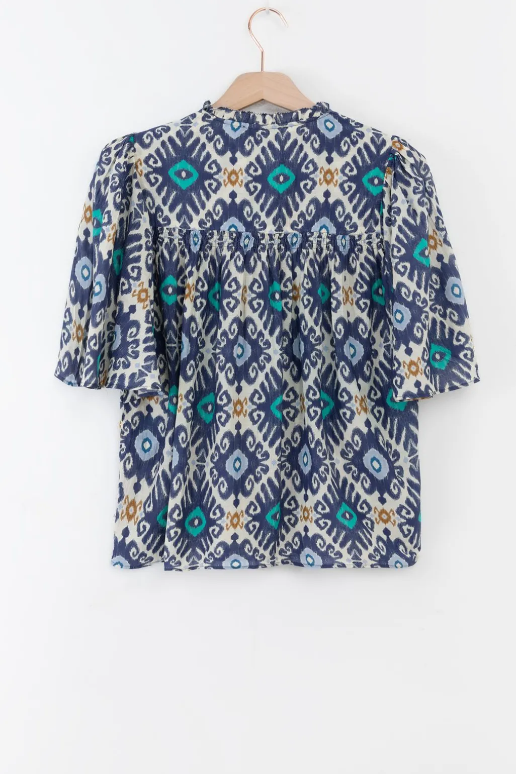Blauwe A-lijn blouse met print
