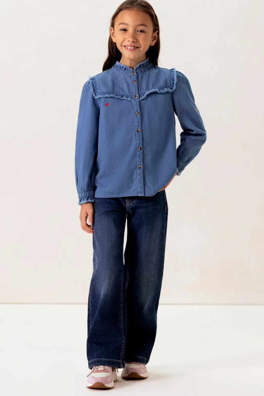 Blauwe denim ruffle blouse