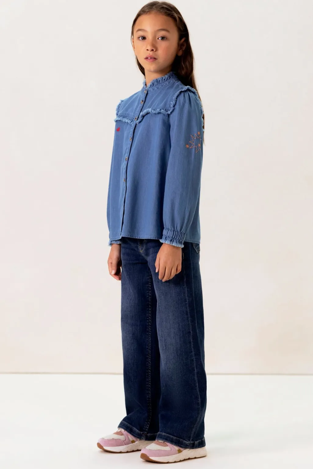 Blauwe denim ruffle blouse
