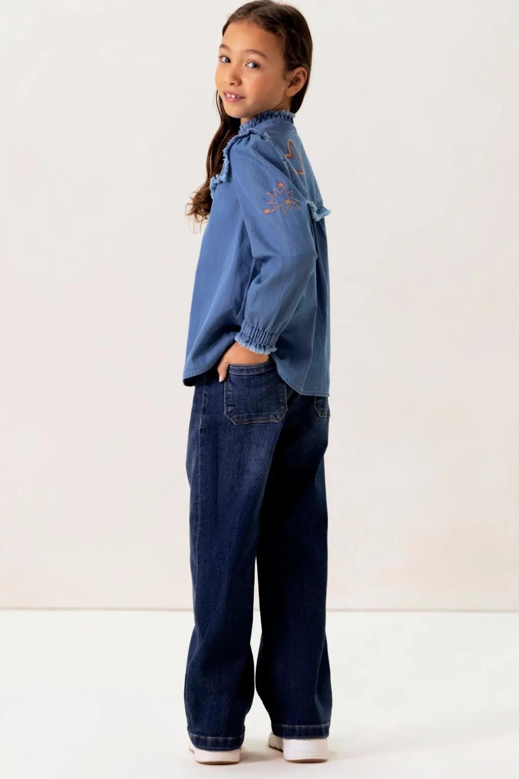 Blauwe denim ruffle blouse
