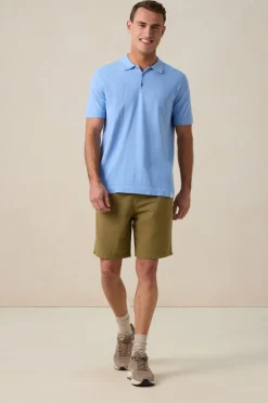 Blauwe gebreide polo