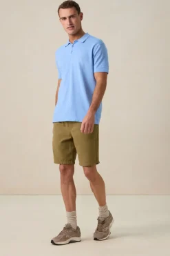 Blauwe gebreide polo