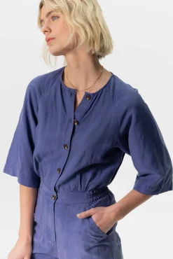 Blauwe jumpsuit met knopen