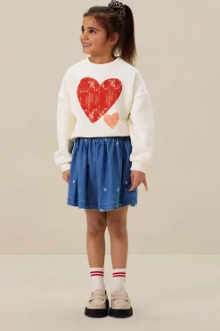 Blauwe rok met madeliefjes embroidery