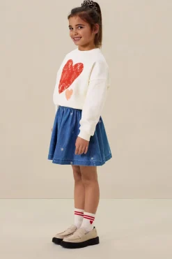 Blauwe rok met madeliefjes embroidery