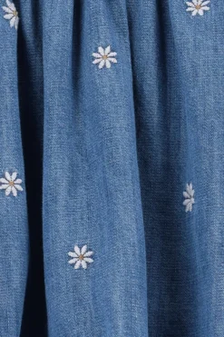 Blauwe rok met madeliefjes embroidery