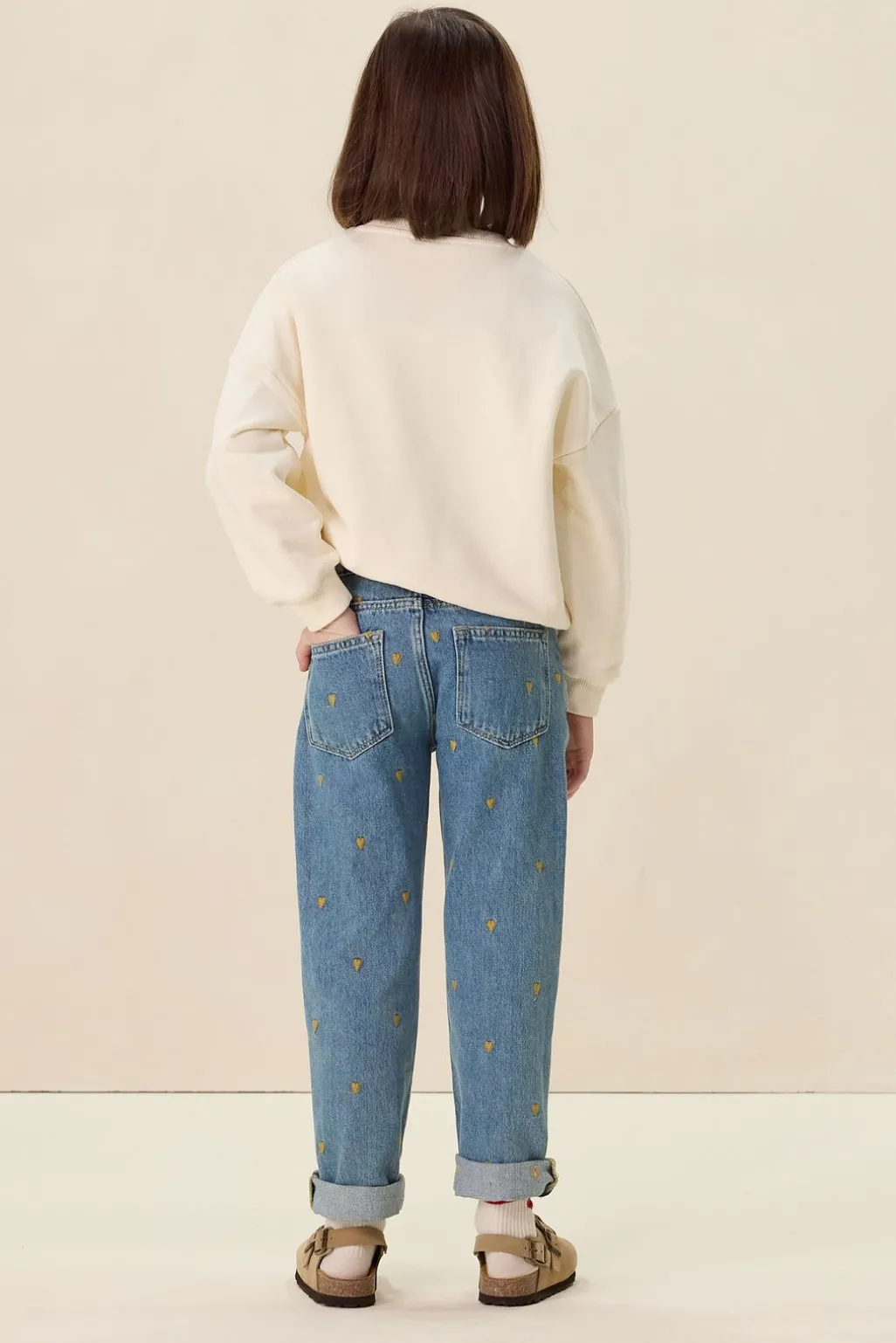 Blauwe tapered jeans met hartjes embroidery