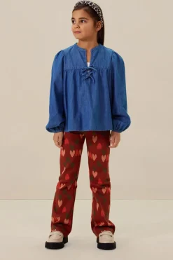 Bruine flared legging met hartjes print