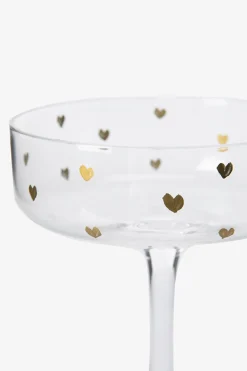 Champagneglazen met gouden hartjes