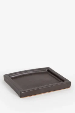 Donkerbruin glazed aardewerk schaaltje