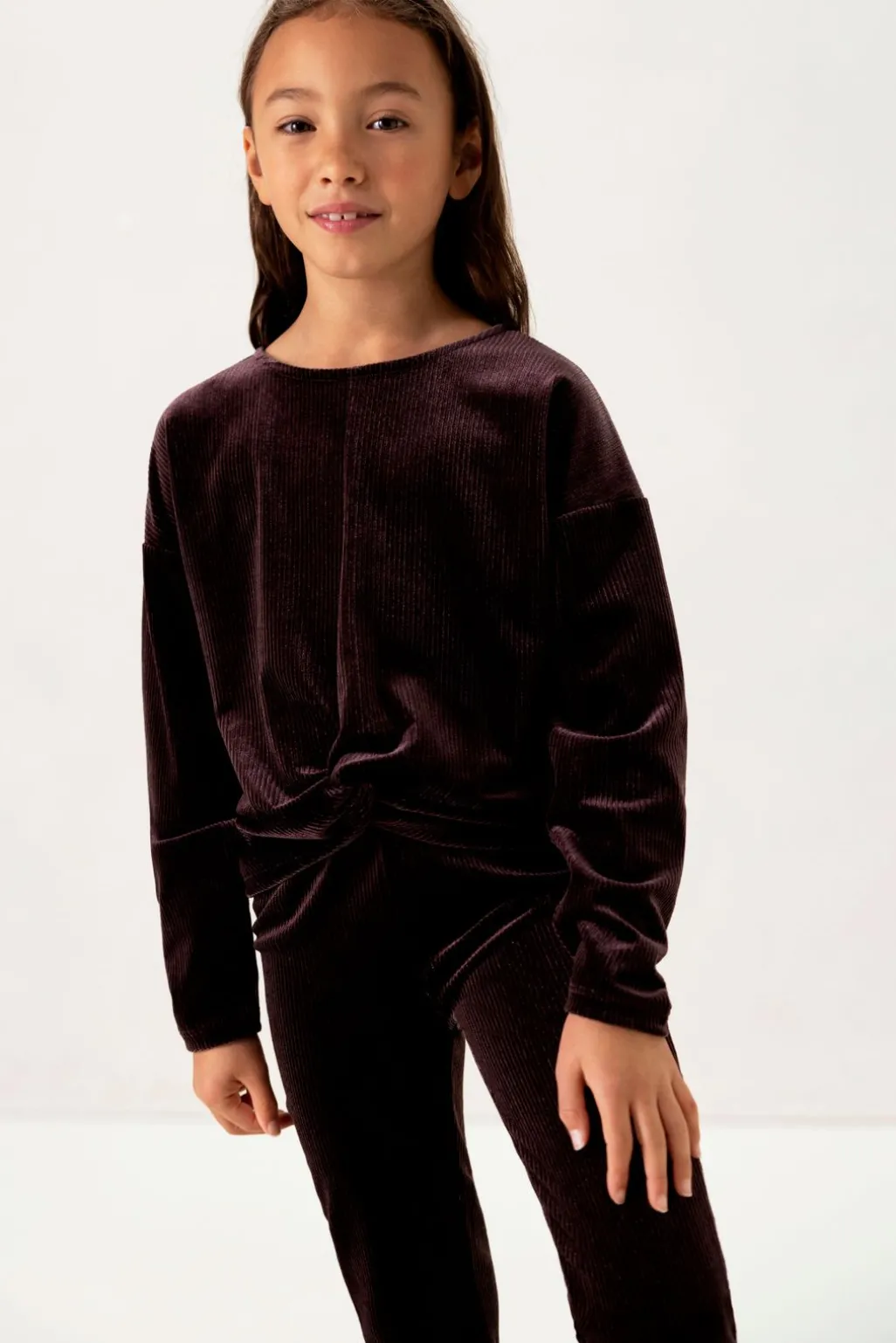 Donkerbruine longsleeve met knoopdetail