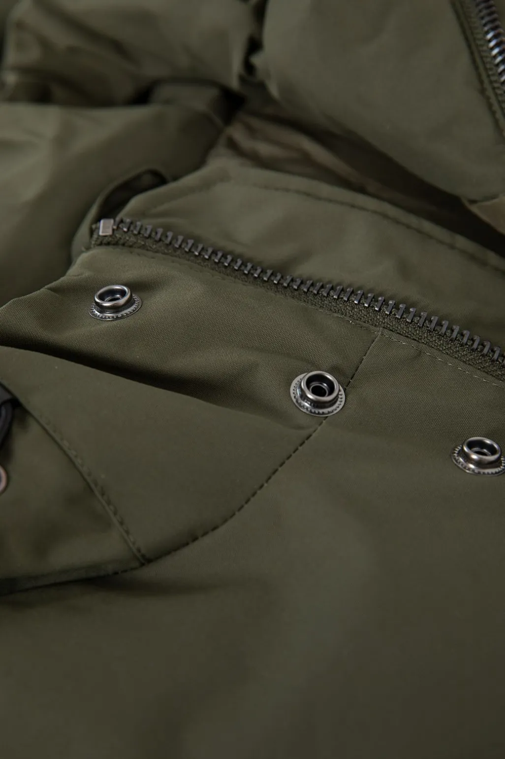 Donkergroene korte parka