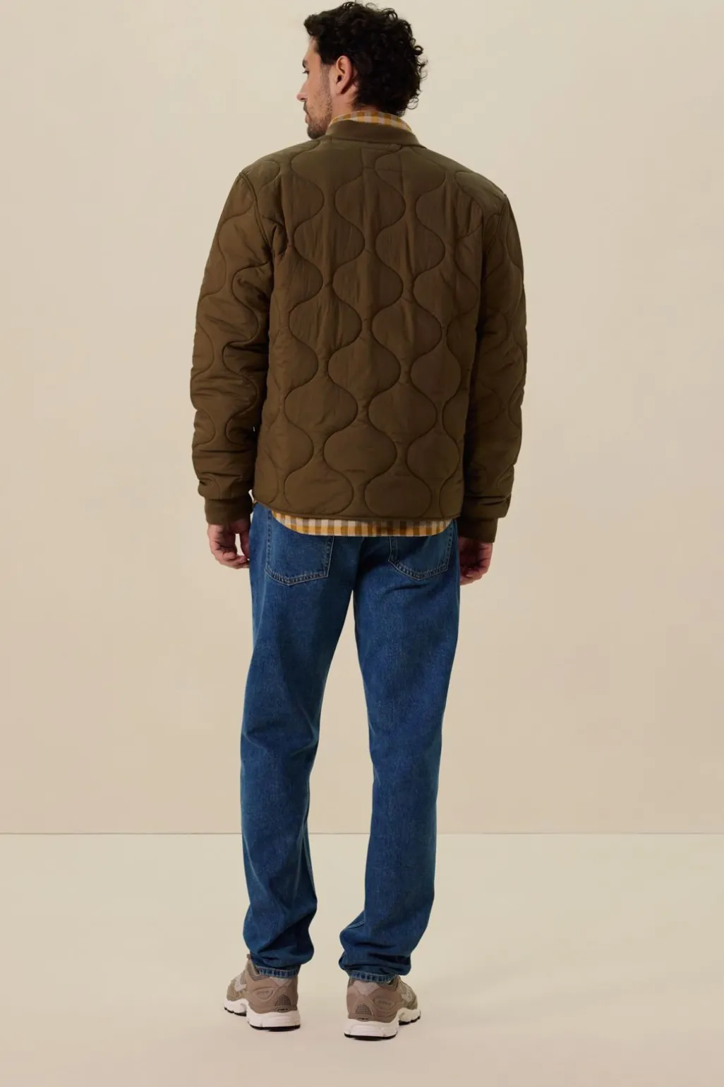 Donkergroene quilted jas