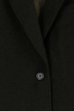 Donkergroene wollen bouclé jas