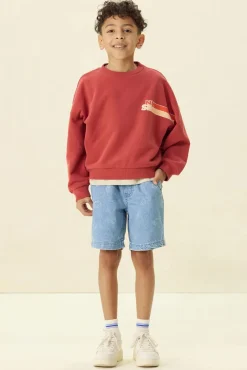 Donkerrode sweater met artwork