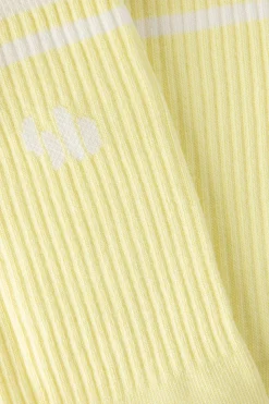 Gele sokken met logo