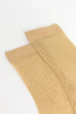 Gouden sheer glittersokken met rib