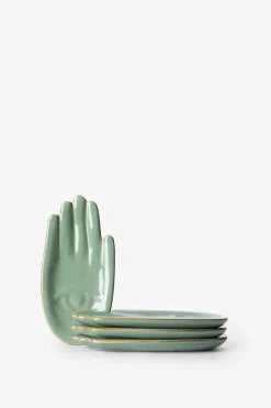 Groene gebaksbordjes hand