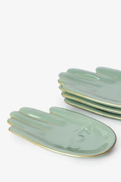 Groene gebaksbordjes hand
