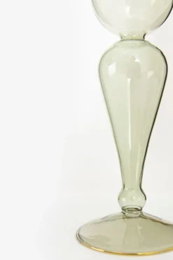 Groene glazen kandelaar met gouden detail