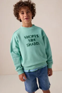 Groene sweater met artwork