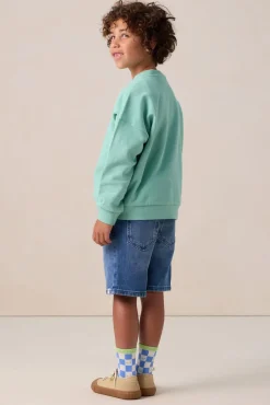 Groene sweater met artwork