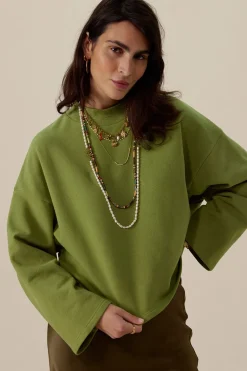 Groene sweater met wijde mouwen