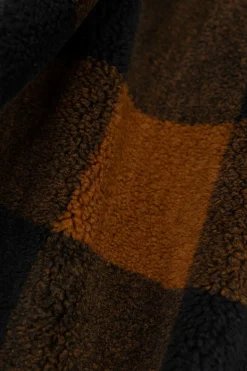 Lange geruite faux fur jas