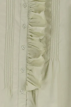 Lichtgroene blouse met borduurwerk
