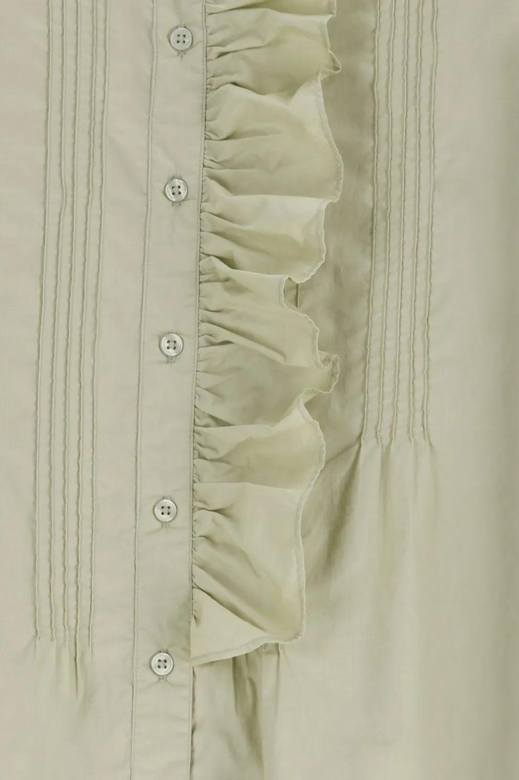 Lichtgroene blouse met borduurwerk