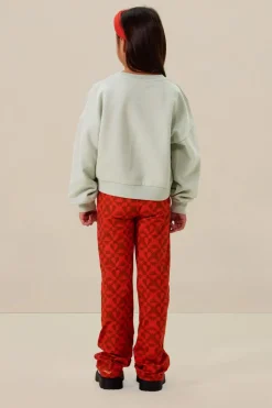 Lichtgroene sweater met tekst