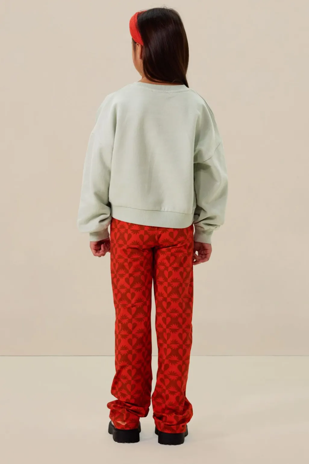 Lichtgroene sweater met tekst