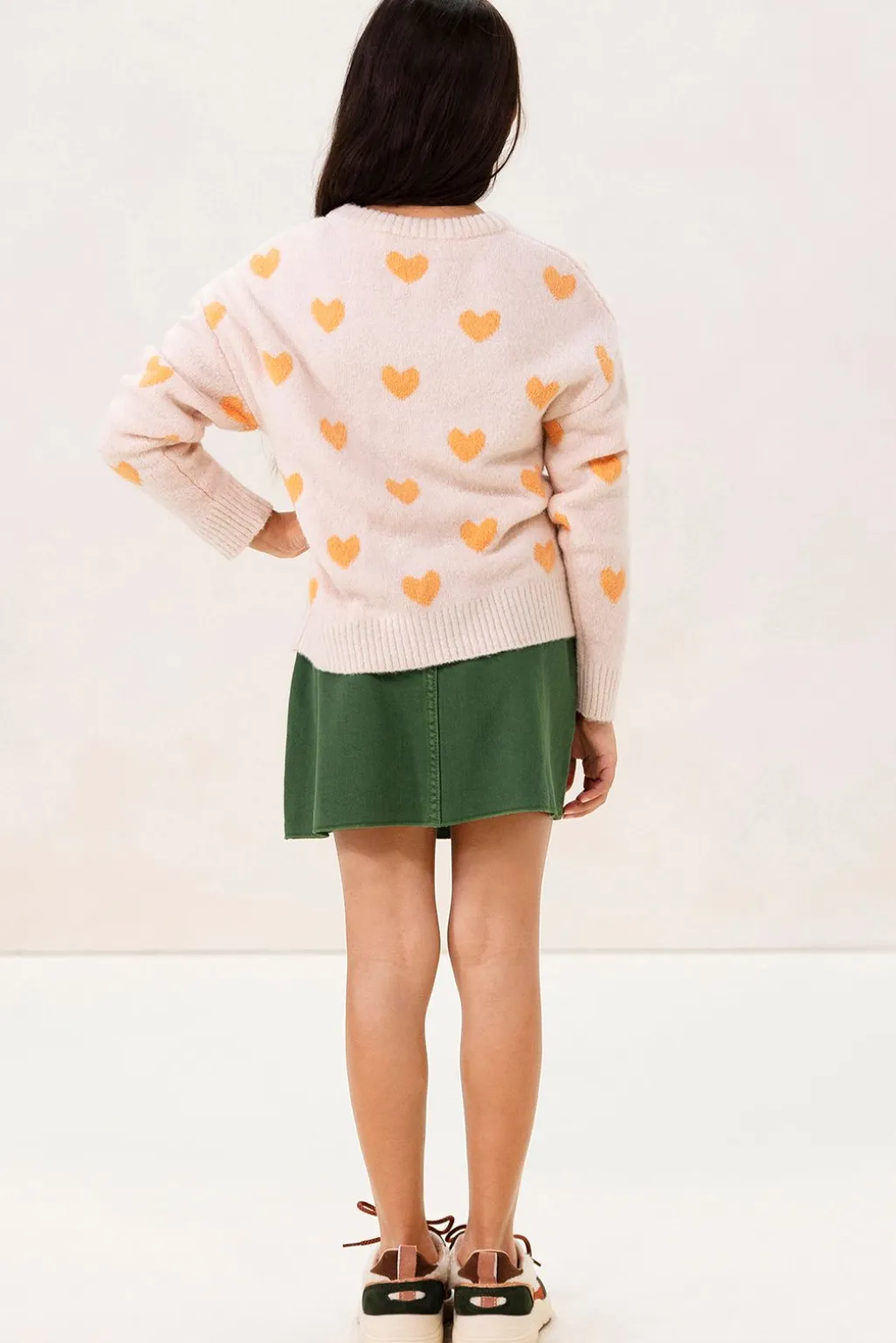 Lichtoranje gebreide trui met jacquard print