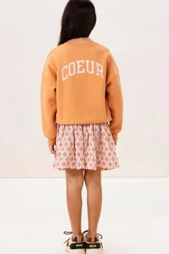 Lichtoranje oversized sweater met artwork
