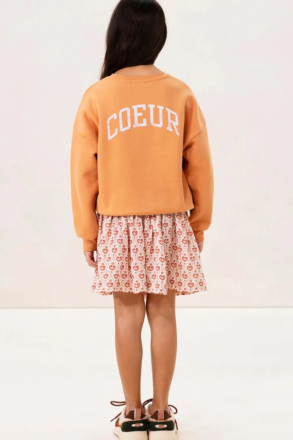 Lichtoranje oversized sweater met artwork