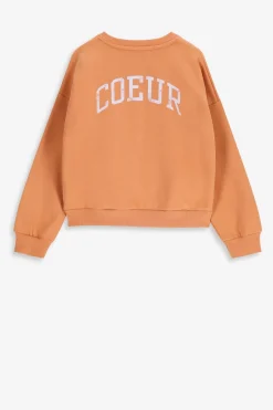 Lichtoranje oversized sweater met artwork