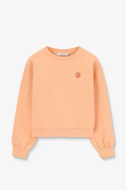 Lichtoranje sweater met artwork